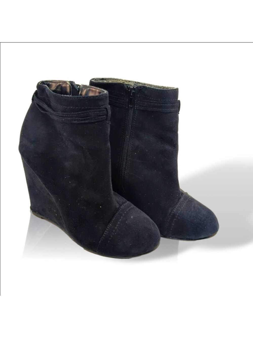 Healed wedge boots with suede-like exterior